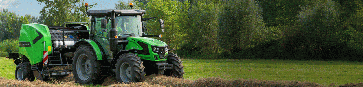 Deutz-Fahr Traktor mit Rundballenpresse